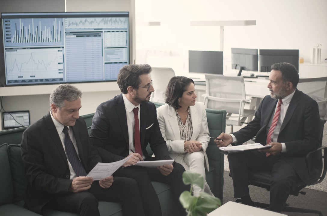 An Ivy team at work with a client